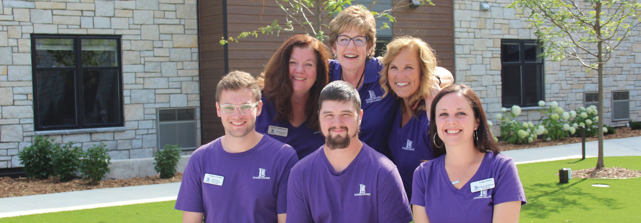 a group of 6 lyngblomsten employees outside smiling